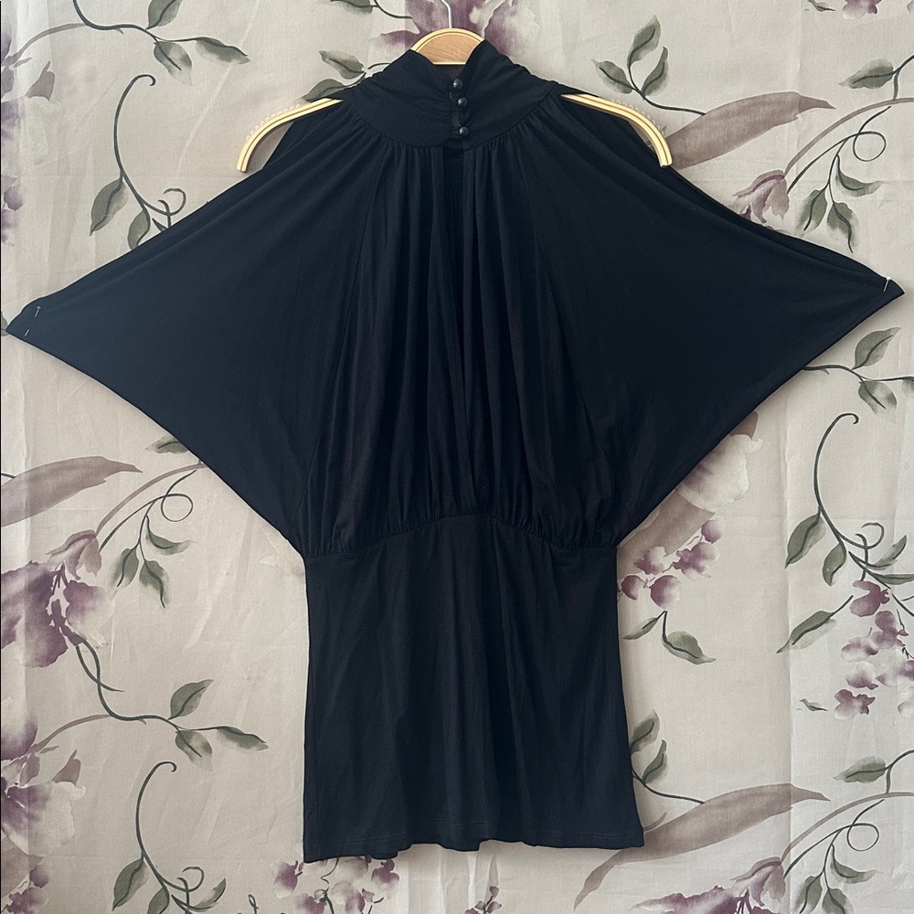 Jersey modal top High neck buttons back neck Gathered all around waist Sleeves